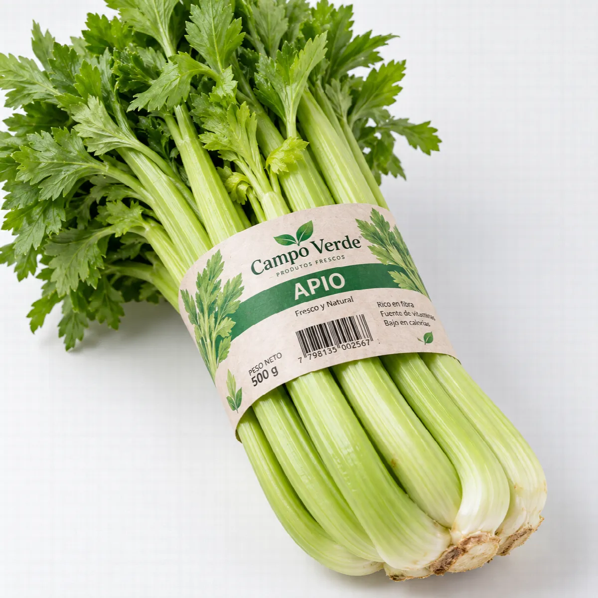 Bunch of celery held by a kraft paper heat-seal band with brand, weight and barcode