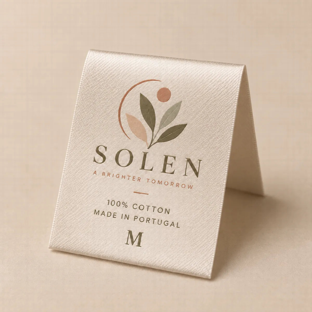 Printed textile label cut and folded in half